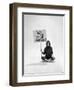 Studio Photos of Gloria Steinem Sitting on Floor with Sign That Says 'We Shall Overcome", 1965-Yale Joel-Framed Photographic Print