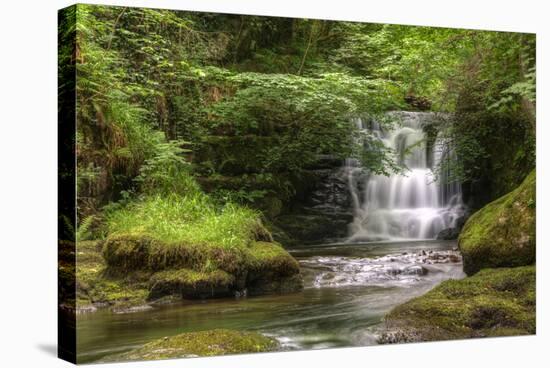 Stunning Waterfall Flowing over Rocks through Lush Green Forest with Long Exposure-Veneratio-Stretched Canvas