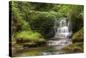 Stunning Waterfall Flowing over Rocks through Lush Green Forest with Long Exposure-Veneratio-Stretched Canvas