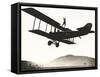 Stunt Woman Standing on Top of Biplane-null-Framed Stretched Canvas