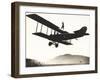 Stunt Woman Standing on Top of Biplane-null-Framed Photo