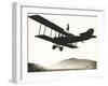 Stunt Woman Standing on Top of Biplane-null-Framed Photo