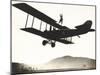 Stunt Woman Standing on Top of Biplane-null-Mounted Photo