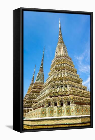 Stupas at Wat Pho (Temple of the Reclining Buddha), Bangkok, Thailand, Southeast Asia, Asia-Jason Langley-Framed Stretched Canvas