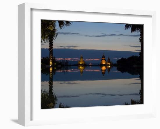 Stupas illuminated at night near infinity pool of Aureum Palace Hotel, Bagan, Mandalay Region, M...-null-Framed Photographic Print