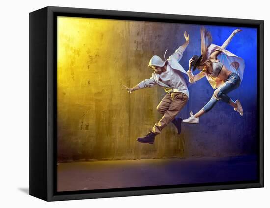 Stylish Dancers Dancing in a Concrete Place-Konrad B?k-Framed Stretched Canvas