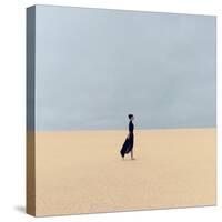 Stylish Girl in Black Clothes Walking in the Desert-Evgeniya Porechenskaya-Stretched Canvas