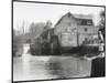 Stylish Woman Well Wrapped up for a Cold Day Stops to Admire Castle Mill Dorking Surrey England-null-Mounted Art Print