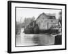 Stylish Woman Well Wrapped up for a Cold Day Stops to Admire Castle Mill Dorking Surrey England-null-Framed Art Print