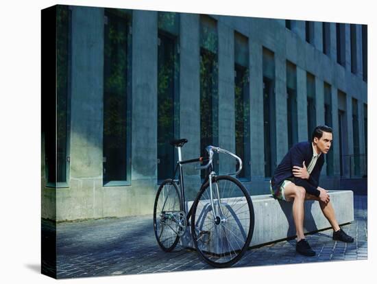 Stylish Young Man with Classic Bicycle Stylish Young Man with Classic Bicycle-GaudiLab-Stretched Canvas