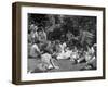 Suburban Family and Guests Having Picnic Supper in Backyard-null-Framed Photographic Print