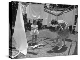 Suburban Mother Playing with Her Two Daughters While Hanging Laundry in Backyard-Alfred Eisenstaedt-Stretched Canvas
