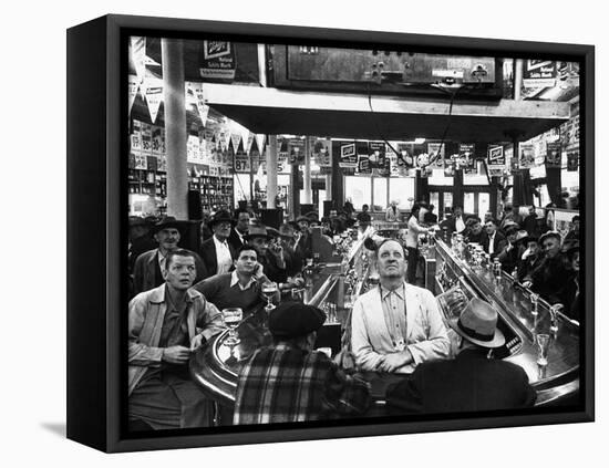 Subway Series: Rapt Audience in Bar Watching World Series Game from New York on TV-Francis Miller-Framed Stretched Canvas