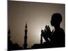 Sudanese Muslim Boy Prays in Front of a Mosque in Sudan-null-Mounted Photographic Print