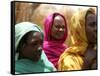 Sudanese Refugees Stand Near Their Huts-null-Framed Stretched Canvas