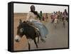 Sudanese Women Ride Donkeys at the Entrance of the Zamzam Refugee Camp-null-Framed Stretched Canvas