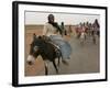 Sudanese Women Ride Donkeys at the Entrance of the Zamzam Refugee Camp-null-Framed Photographic Print