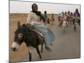 Sudanese Women Ride Donkeys at the Entrance of the Zamzam Refugee Camp-null-Mounted Photographic Print