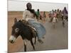 Sudanese Women Ride Donkeys at the Entrance of the Zamzam Refugee Camp-null-Mounted Photographic Print