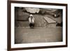 Suffering Young Woman on Urban Scenery. Hard Sepia Toned with Vignetting.-Jose AS Reyes-Framed Photographic Print