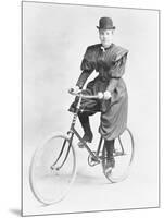 Suffragette Dressed in Man's Hat on Bicycle-null-Mounted Photographic Print