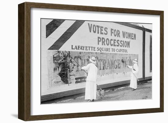 Suffragettes Uses Long Brushes To Post a Billboard Announcing a "Votes" For Women" Parade-null-Framed Art Print