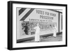 Suffragettes Uses Long Brushes To Post a Billboard Announcing a "Votes" For Women" Parade-null-Framed Art Print