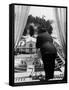 Suit Clad Movie Director Alfred Hitchcock as He Leans on Balcony Railing of Apartment-Peter Stackpole-Framed Stretched Canvas