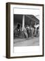 Suiting Up for Baseball at the Gasoline Station-Dorothea Lange-Framed Art Print