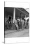 Suiting Up for Baseball at the Gasoline Station-Dorothea Lange-Stretched Canvas