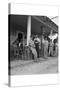 Suiting Up for Baseball at the Gasoline Station-Dorothea Lange-Stretched Canvas