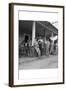 Suiting Up for Baseball at the Gasoline Station-Dorothea Lange-Framed Art Print