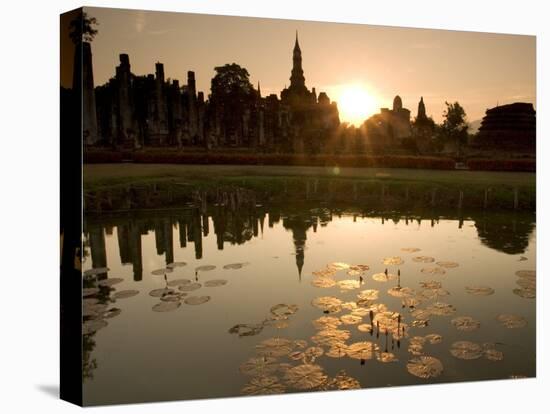 Sukhothai Ruins and Sunset Reflected in Lotus Pond, Thailand-Gavriel Jecan-Stretched Canvas