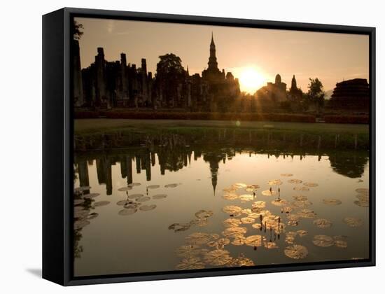 Sukhothai Ruins and Sunset Reflected in Lotus Pond, Thailand-Gavriel Jecan-Framed Stretched Canvas