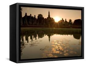 Sukhothai Ruins and Sunset Reflected in Lotus Pond, Thailand-Gavriel Jecan-Framed Stretched Canvas