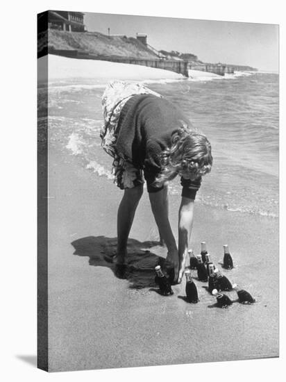 Summer at Cape Cod: Bottles of Coca Cola Buried in the Surf to Keep Them Cool-Alfred Eisenstaedt-Stretched Canvas