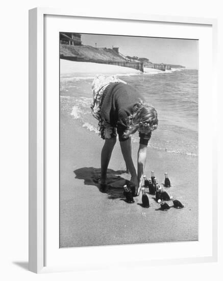 Summer at Cape Cod: Bottles of Coca Cola Buried in the Surf to Keep Them Cool-Alfred Eisenstaedt-Framed Photographic Print