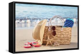 Summer Beach Bag with Straw Hat,Towel,Sunglasses and Flip Flops on Sandy Beach-Liang Zhang-Framed Stretched Canvas