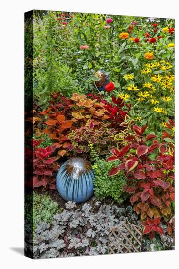 Summer flowers and coleus plants in bronze and reds, Sammamish, Washington State-Darrell Gulin-Stretched Canvas