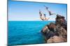 Summer Fun, Friends Cliff Jumping into the Ocean.-EpicStockMedia-Mounted Photographic Print