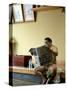 Sumo Wrestler Reading Newspaper, Tokyo City, Honshu Island, Japan-Christian Kober-Stretched Canvas