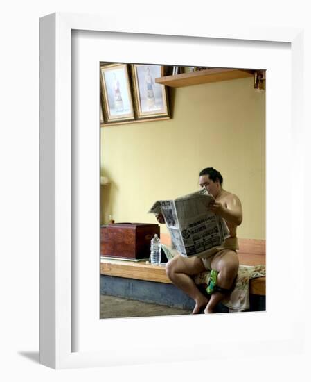 Sumo Wrestler Reading Newspaper, Tokyo City, Honshu Island, Japan-Christian Kober-Framed Photographic Print