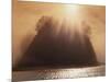 Sun Beams Breaking through Fog over Sea Stack-James Randklev-Mounted Photographic Print