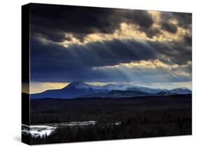 Sun Rays Filter Through Clouds over Mount Katahdin in Maine's Baxter State Park-null-Stretched Canvas