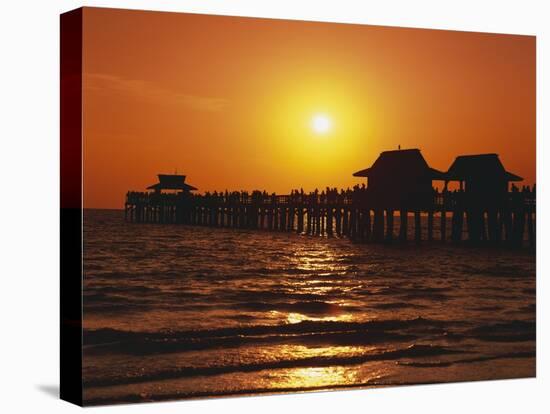 Sun Setting Above Naples Pier-James Randklev-Stretched Canvas