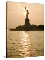 Sun Setting Behind the Statue of Liberty on a Summer Evening-John Nordell-Stretched Canvas