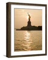 Sun Setting Behind the Statue of Liberty on a Summer Evening-John Nordell-Framed Photographic Print