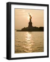 Sun Setting Behind the Statue of Liberty on a Summer Evening-John Nordell-Framed Photographic Print