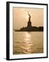 Sun Setting Behind the Statue of Liberty on a Summer Evening-John Nordell-Framed Photographic Print