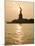 Sun Setting Behind the Statue of Liberty on a Summer Evening-John Nordell-Mounted Photographic Print